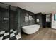 Spa-like bathroom with soaking tub and walk-in shower at 2001 Lincoln St # 3223, Denver, CO 80202