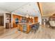 Open kitchen features a large island with breakfast bar and wine cooler at 2001 Lincoln St # 3223, Denver, CO 80202
