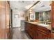 Double vanity bathroom with marble countertops at 2001 Lincoln St # 3223, Denver, CO 80202
