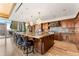 Spacious kitchen with granite countertops and custom cabinetry at 2001 Lincoln St # 3223, Denver, CO 80202