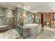 Spa-like bathroom with a large soaking tub and walk-in shower at 2001 Lincoln St # 3223, Denver, CO 80202