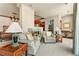 Sitting area in main bedroom with fireplace and plush seating at 2001 Lincoln St # 3223, Denver, CO 80202