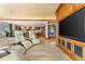 Relaxing media room with comfortable seating and built-in entertainment center at 2001 Lincoln St # 3223, Denver, CO 80202