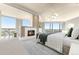 Luxurious bedroom with fireplace and city views at 2001 Lincoln St # 3223, Denver, CO 80202