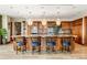 Gourmet kitchen boasts a large island with seating and high-end appliances at 2001 Lincoln St # 3223, Denver, CO 80202