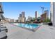 Inviting rooftop pool with city views and lounge chairs at 2001 Lincoln St # 3223, Denver, CO 80202