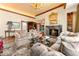 Elegant living room with fireplace and seating area at 2001 Lincoln St # 3223, Denver, CO 80202