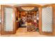 Luxurious home office with built-in bookshelves and wood detailing at 2001 Lincoln St # 3223, Denver, CO 80202