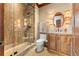 Stylish bathroom with a glass shower and stone tile at 2001 Lincoln St # 3223, Denver, CO 80202
