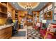 Spacious home office, featuring wood-paneled walls and a large desk at 2001 Lincoln St # 3223, Denver, CO 80202