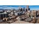 Aerial view showcasing the cityscape and mountain backdrop at 550 E 12Th Ave # 907, Denver, CO 80203