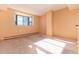 Bright bedroom with large window and neutral decor at 550 E 12Th Ave # 907, Denver, CO 80203