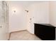 Inviting entryway with built-in storage and tile flooring at 550 E 12Th Ave # 907, Denver, CO 80203