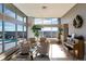 Relaxing lobby with city views, comfortable seating, and a piano at 550 E 12Th Ave # 907, Denver, CO 80203