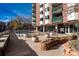 Inviting pool area with surrounding landscaping and seating at 550 E 12Th Ave # 907, Denver, CO 80203