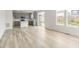 Modern kitchen with gray cabinets and an island at 13332 E 110Th Way, Commerce City, CO 80022