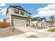 Two-story house with stone and siding exterior at 13332 E 110Th Way, Commerce City, CO 80022
