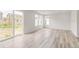 Bright dining room with sliding glass doors leading to backyard at 13332 E 110Th Way, Commerce City, CO 80022