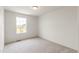 Well-lit bedroom with a window and neutral decor at 13332 E 110Th Way, Commerce City, CO 80022