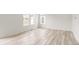 Light and airy living room with hardwood floors at 13332 E 110Th Way, Commerce City, CO 80022