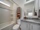 Clean bathroom with shower/tub combo and granite vanity at , Commerce City, CO 80022