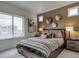 Main bedroom with large window and stylish decor at , Commerce City, CO 80022