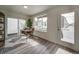 Sunlit home office features a door and window views at , Commerce City, CO 80022