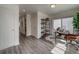 Bright home office features built-in shelving and large window at , Commerce City, CO 80022