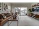 Spacious living area with sliding glass doors and city views at , Commerce City, CO 80022