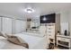 Spacious main bedroom with a large bed, ample closet space, and a flat screen TV at 109 Wooster Dr, Firestone, CO 80520