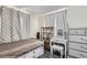 Bedroom with bed, dresser, and vanity area at 109 Wooster Dr, Firestone, CO 80520
