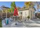 Patio with table, chairs, and heater at 109 Wooster Dr, Firestone, CO 80520