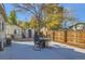 Backyard with patio, fire pit, and storage shed at 109 Wooster Dr, Firestone, CO 80520