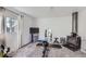 Recreation room with exercise equipment and wood stove at 109 Wooster Dr, Firestone, CO 80520