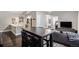 Modern kitchen with white cabinets and a large island at 1623 Saint Paul St # 410, Denver, CO 80206