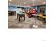 Community game room featuring foosball, arcade games, and seating at 1627 Ski Hill Rd # 2236Eghi, Breckenridge, CO 80424