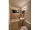 Bathroom with tub and updated tile at 3577 S Pennsylvania St, Englewood, CO 80113