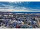 Aerial view of houses with snow covered roofs and open space at 4034 Miners Candle Dr, Castle Rock, CO 80109