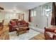 Living room with leather couches and hardwood floors at 931 Fairview Blvd # 3, Breckenridge, CO 80424