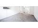 Primary bedroom with gray carpet and access to bathroom at 9340 E Center Ave # 8B, Denver, CO 80247