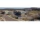 View of townhomes, parking, and nearby amenities at 3654 Penang Dr, Castle Rock, CO 80109