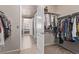 Large walk-in closet with ample hanging space at 7426 E 148Th Pl, Thornton, CO 80602