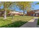 Common area with grassy lawn and trees at 8051 Wolff St # C, Westminster, CO 80031