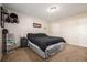 Cozy bedroom with a double bed and nightstand at 8051 Wolff St # C, Westminster, CO 80031