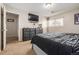 Bright bedroom with a large bed and dresser at 8051 Wolff St # C, Westminster, CO 80031