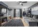Spacious living area showcasing a large TV and comfortable seating at 8051 Wolff St # C, Westminster, CO 80031