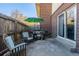 Private patio with seating and gas grill at 8051 Wolff St # C, Westminster, CO 80031