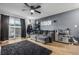 Bright living room with a sliding glass door leading to the backyard at 8051 Wolff St # C, Westminster, CO 80031