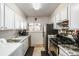 Well-equipped kitchen offering ample storage and modern appliances at 8051 Wolff St # C, Westminster, CO 80031