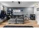 Cozy living room featuring a comfortable sectional sofa and access to a patio at 8051 Wolff St # C, Westminster, CO 80031
